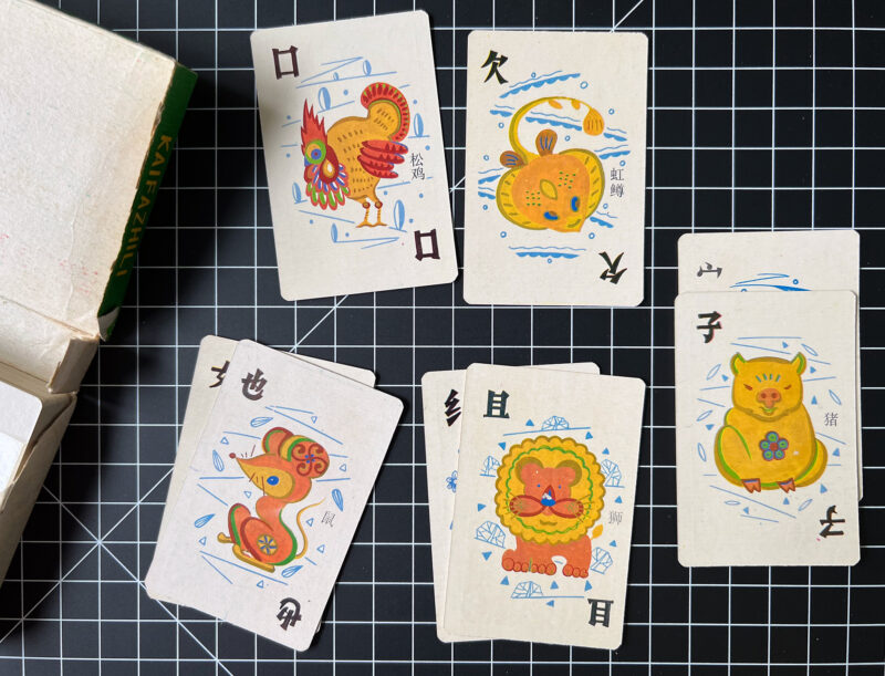 Some photos of cards, showing how they might be combined by placing the cards next to or on top of one another.